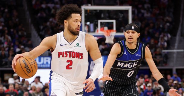 Pistons' Cade Cunningham is pursued by Magic's Anthony Black during an NBA Playoffs game in Detroit, Michigan, April 29, 2026. (AFP Photo)