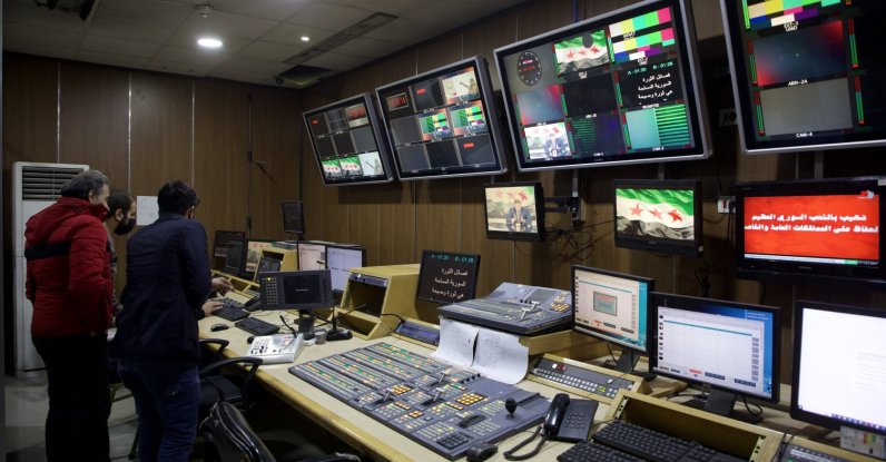 People are seen inside the broadcast studio of the General Organization of Radio and TV Syria, in Damascus, Syria, Dec. 8, 2024. (Getty Images)