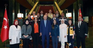 President Recep Tayyip Erdoğan (C) poses with representatives of workers, civil servants and employers during a May 1 Labor and Solidarity Day reception at the Presidential Complex, Ankara, Türkiye, April 30, 2026. (AA Photo)