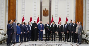 Iraqi President Nizar Amedi stands with Prime Minister-designate Ali al-Zaidi and political figures during a ceremony assigning him to form a new government, Baghdad, Iraq, April 27, 2026. (Reuters Photo)