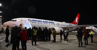 Plane carrying Sumud flotilla activists lands in Istanbul Airport, May 1, 2026. (AA Photo)