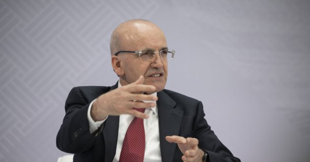 Treasury and Finance Minister Mehmet Şimşek speaks at a panel on the sidelines of the IMF-World Bank Spring Meetings, Washington, U.S., April 17, 2026. (AA Photo)