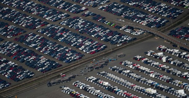 This aerial file photo shows new cars for sale parked at the harbor of Duisburg, western Germany, May 8, 2020. (AFP File Photo)