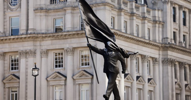 A statue depicting a person stepping off the plinth while carrying a flag covering their face, by British street artist Banksy, stands in London, U.K., April 30, 2026. (Reuters Photo)