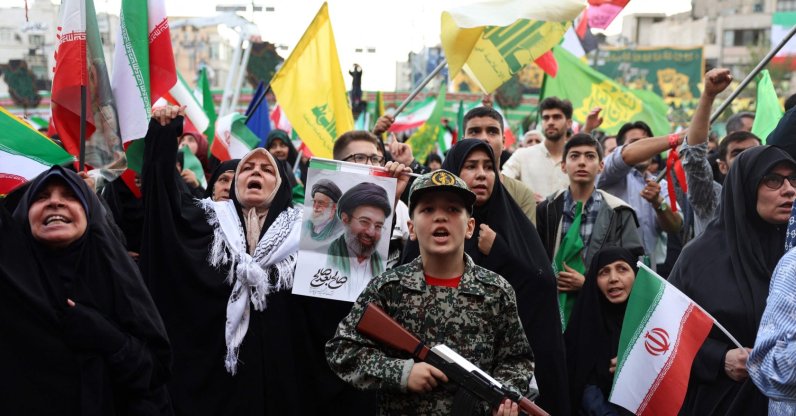 A young enthusiast dressed in military attire holds a mock rifle during a rally to show solidarity and support for the Iranian supreme leader, Ayatollah Mojataba Khamenei, Tehran, Iran, April 29, 2026. (AFP Photo)