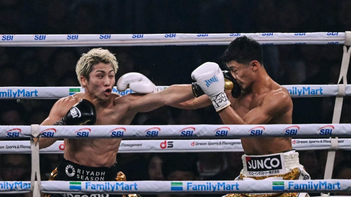 Naoya Inoue (L) fights Junto Nakatani during their super bantamweight championship boxing contest at Tokyo Dome in Tokyo, Japan, May 2, 2026. (AFP Photo)