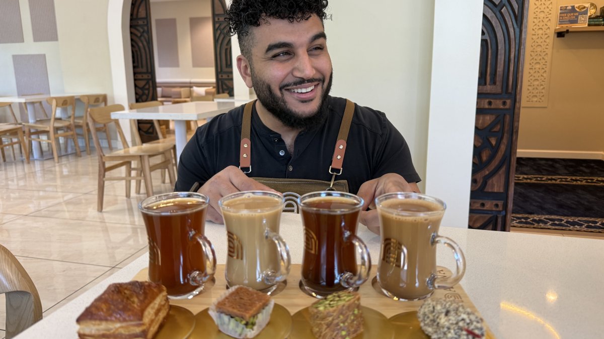 Franchisee Ahmad Badr serves a drink and treat sampler at Arwa Yemeni Coffee, California, U.S.,  April 6, 2026. (AP Photo)