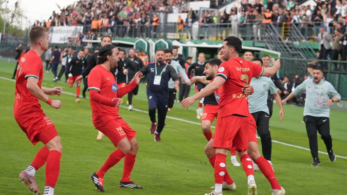 Amedspor players and officials celebrate their promotion to the Turkish Süper Lig after a 3-3 draw against Iğdır in the TFF 1. Lig, in Iğdır, Türkiye, May 2, 2026. (AA Photo)