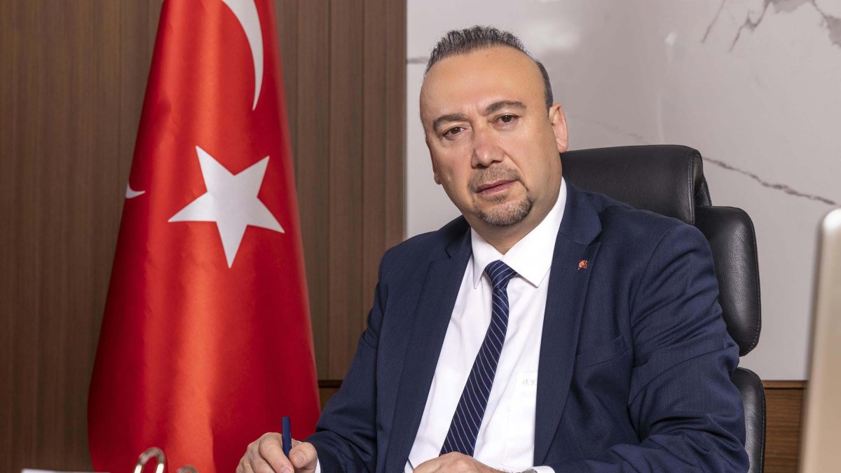 An undated photo of Özkan Yalım in his office, Uşak, western Türkiye. (DHA Photo)