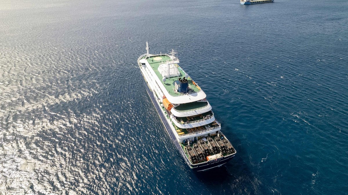 This aerial picture shows a general view of the cruise ship MV Hondius stationary off the port of Praia, the capital of Cape Verde, May 3, 2026. (AFP Photo)