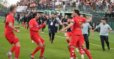 Amedspor players and officials celebrate their promotion to the Turkish Süper Lig after a 3-3 draw against Iğdır in the TFF 1. Lig, in Iğdır, Türkiye, May 2, 2026. (AA Photo)