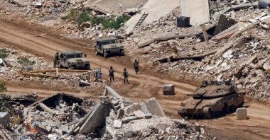 Invading Israeli troops and military vehicles are seen among destroyed houses in southern Lebanon, April 29, 2026. (AFP Photo)