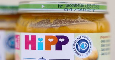 A jar of baby food produced by German baby food manufacturer HiPP is seen at a supermarket in Paris, France, April 21, 2026. (AFP Photo)