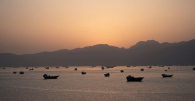 Ships and boats in the Strait of Hormuz, Musandam, Oman, May 1, 2026. (Reuters Photo)