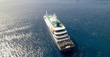 This aerial picture shows a general view of the cruise ship MV Hondius stationary off the port of Praia, the capital of Cape Verde, May 3, 2026. (AFP Photo)