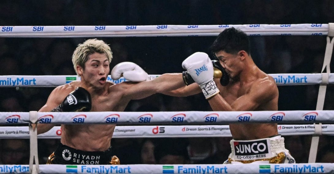 Naoya Inoue (L) fights Junto Nakatani during their super bantamweight championship boxing contest at Tokyo Dome in Tokyo, Japan, May 2, 2026. (AFP Photo)