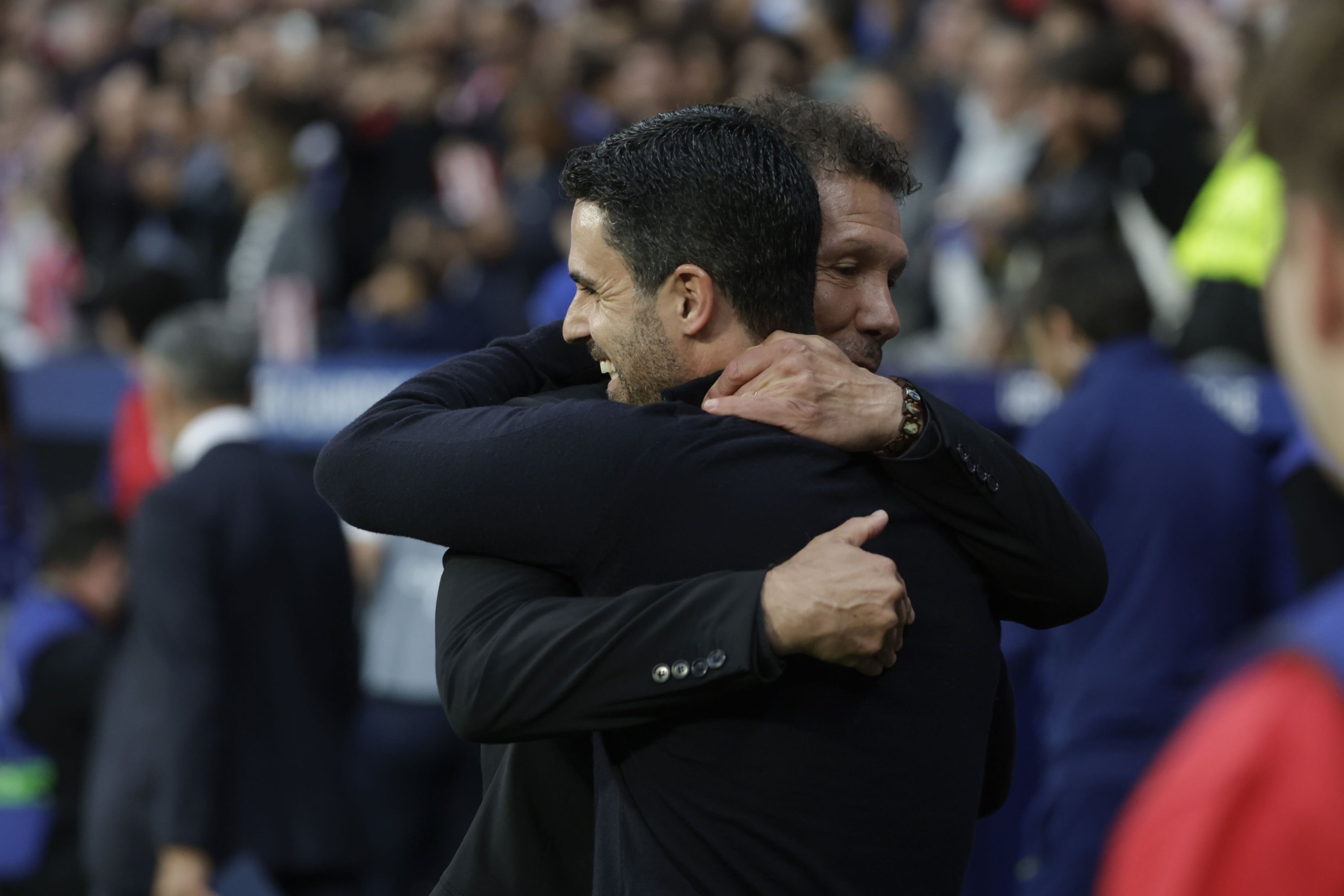 Atletico's head coach Diego Simeone (R) embraces Arsenal's head coach Mikel Arteta ahead of the UEFA Champions League semifinal first leg match at Riyadh Air Metropolitano, Madrid, Spain, April 29, 2026. (EPA Photo)