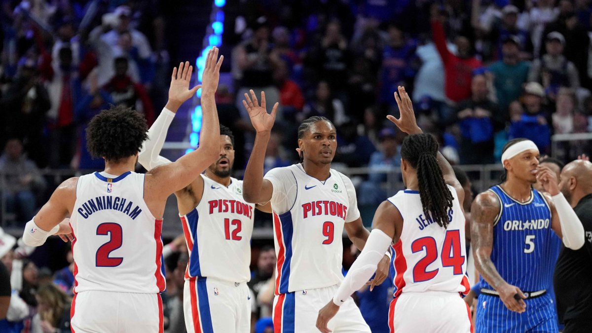 (L-R) Detroit Pistons Cade Cunningham, Tobias Harris, Ausar Thompson and Daniss Jenkins celebrate a basket against Orlando Magic's Paolo Banchero during the second quarter in Game Seven of the First Round of the NBA Eastern Conference Playoffs at Little Caesars Arena, Detroit, U.S., May 3, 2026. (AFP Photo)