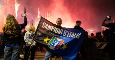 Inter Milan's supporters celebrate after winning their 21st 'Scudetto' following the Italian Serie A football match between Inter Milan and Parma at San Siro stadium, Milan, Italy, May 3, 2026. (AA Photo)