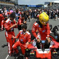 Ferrari's British driver Lewis Hamilton gets into his car at the starting grid before the start of the 2026 Miami Formula One Sprint at Miami International Autodrome, Miami Gardens, May 2, 2026. (AFP Photo)