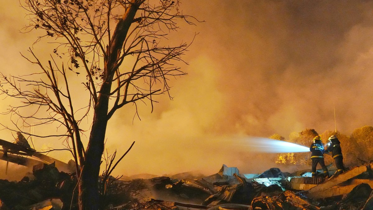 Firefighters work to extinguish a fire following a blast at a fireworks manufacturing factory in Liuyang, Hunan province, China, May 5, 2026. (Reuters Photo)