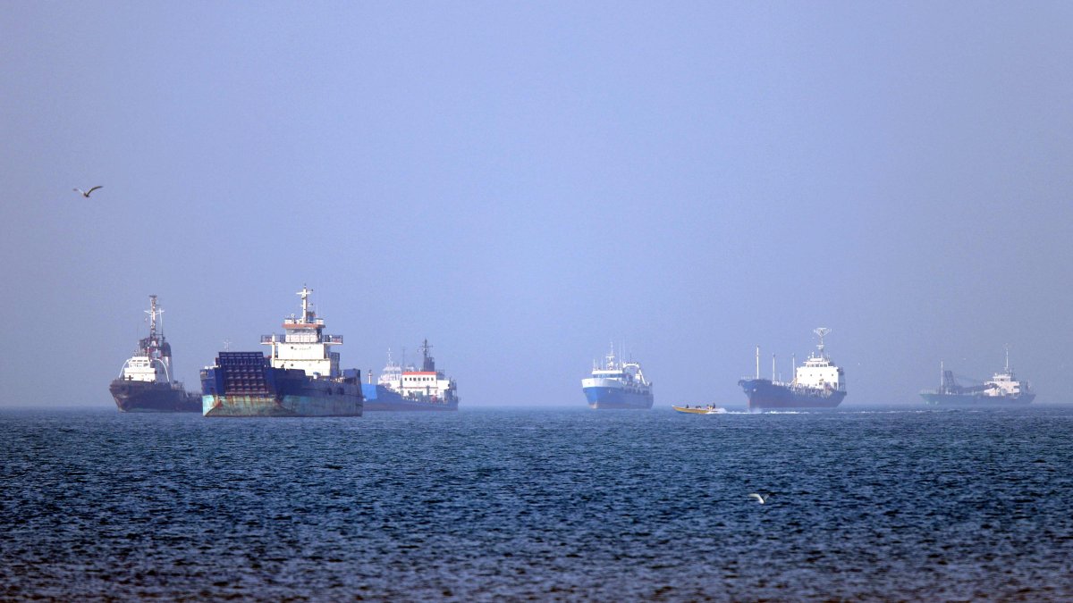 Vessels are pictured anchored in the Strait of Hormuz off Bandar Abbas in southern Iran, May 4, 2026. (AFP via Isna)