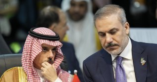 Saudi Arabian Foreign Minister Prince Faisal bin Farhan Al Saud (L) and Foreign Minister Hakan Fidan attend the G-20 foreign ministers meeting, Rio de Janeiro, Brazil, Feb. 21, 2024. (AP Photo)