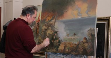 Şakir Şeyihoğlu depicts Trabzon's history on canvas through Ottoman and Republican-era paintings using the Chinese ink technique, Trabzon, Türkiye, May 2, 2026. (AA Photo)