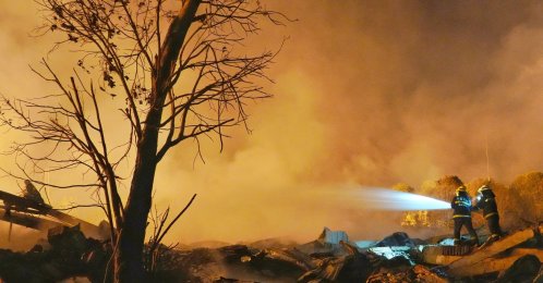 Firefighters work to extinguish a fire following a blast at a fireworks manufacturing factory in Liuyang, Hunan province, China, May 5, 2026. (Reuters Photo)