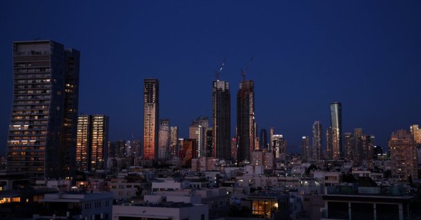 A city skyline with apartment blocks and office buildings under construction, Tel Aviv, Israel, April 22, 2026. (Reuters Photo)