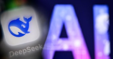 This photo shows the letters AI next to the logo of the Deepseek AI application on a smartphone screen, Frankfurt, Germany,  Sept. 1, 2025. (AFP Photo)