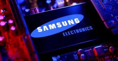 A Samsung Electronics logo and a computer motherboard appear in this illustration, Aug. 25, 2025. (Reuters Photo)