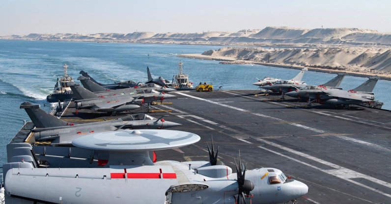 A handout picture released by the French Navy shows the flight deck of the French Navy's flagship aircraft carrier Charles de Gaulle transiting the Suez Canal en route to the southern Red Sea to pre-position for a possible mission to restore navigation in the Strait of Hormuz, May 6, 2026. (AFP Photo)