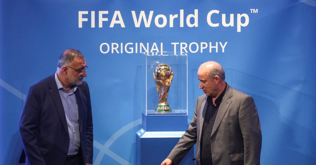 President of Iran Football Federation Mehdi Taj and Mayor of Tehran Alireza Zakani stand next to the FIFA World Cup Trophy during an unveiling ceremony, Tehran, Iran, Sept. 1, 2022. (Reuters Photo)