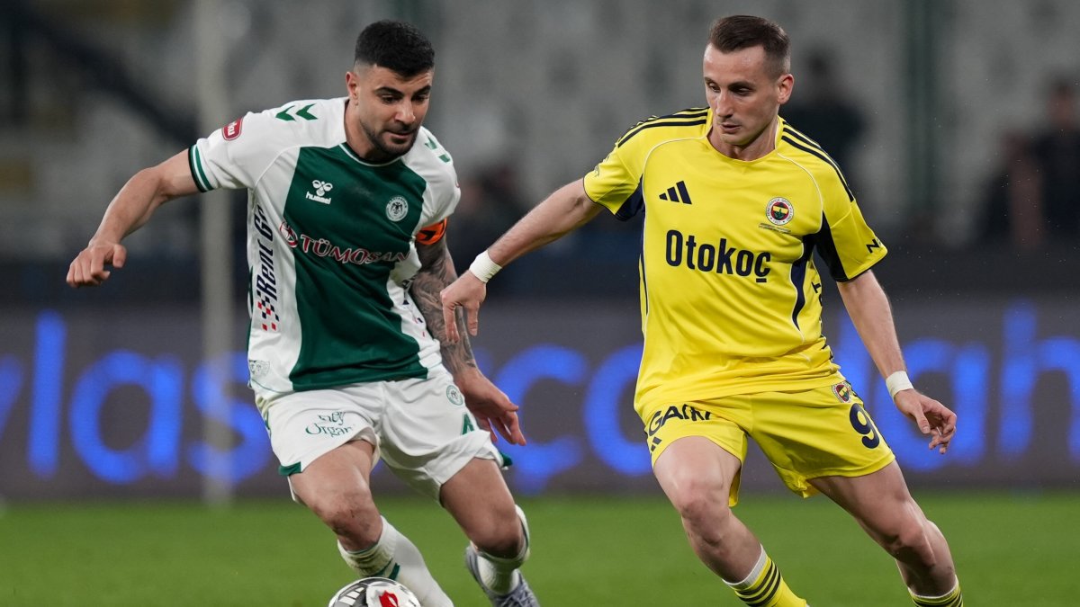 Fenerbahçe's Kerem Aktürkoğlu (R) and Konyaspor's Adil Demirbağ battle for the ball during the Ziraat Turkish Cup quarterfinal match at Medaş Konya Metropolitan Stadium, Konya, Türkiye, April 21, 2026. (AA Photo)
