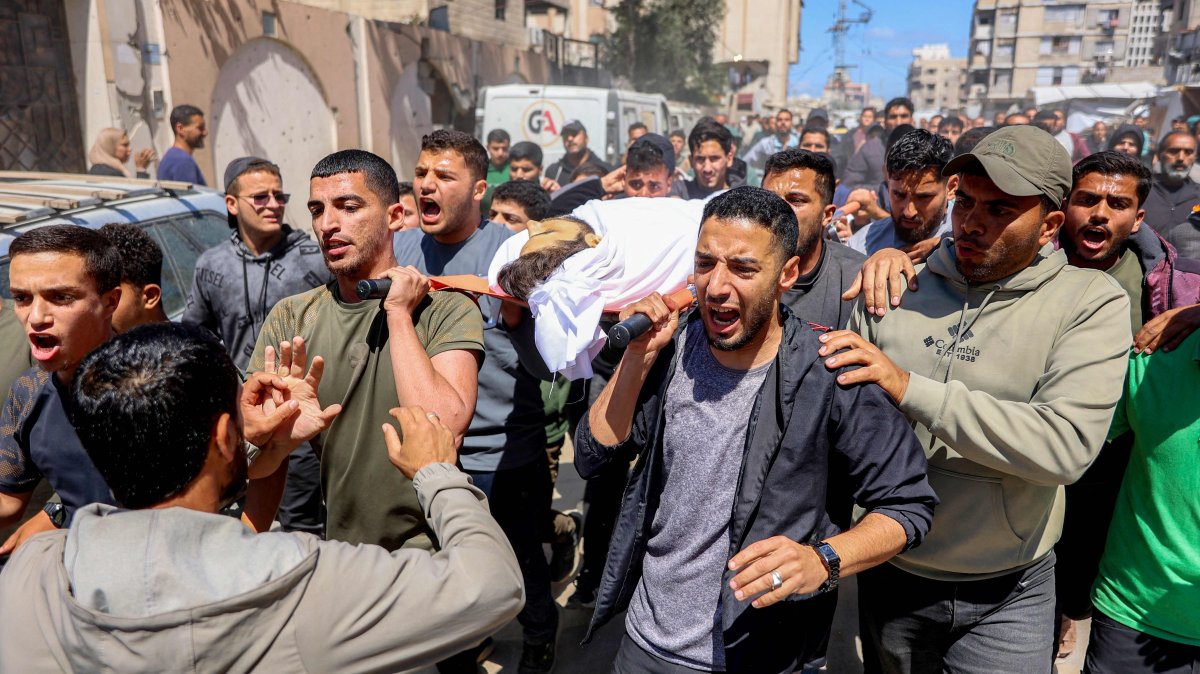 Mourners carry the body of Azzam Khalil al-Hayya, son of the deputy chairman of Hamas' Political Bureau Khalil al-Hayya, after the former was killed the previous day by Israeli bombardment, during the funeral in Gaza City, Palestine, May 7, 2026. (AFP Photo)