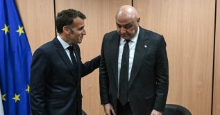 France's President Emmanuel Macron (L) meets with Lebanon's President Joseph Aoun in Nicosia on April 24, 2026, on the sidelines of a European summit. European leaders vowed on April 24 to do more to de-escalate conflicts in the Middle East, as they prepared for discussions with regional counterparts from Egypt, Lebanon and Syria in Cyprus. (Photo by NICOLAS TUCAT / POOL / AFP)