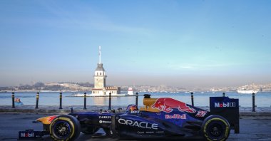 A Formula One car is displayed with the Maiden Tower showing in the background, Istanbul, Türkiye, April 24, 2026. (AA Photo)