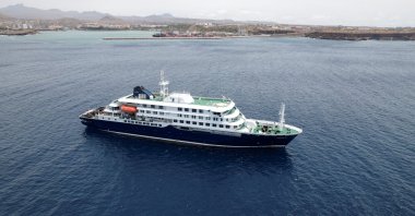 A drone view of the cruise ship MV Hondius, carrying passengers suspected of having cases of hantavirus on board, as it prepares to leave Praia, Cape Verde, May 6, 2026. (Reuters Photo)