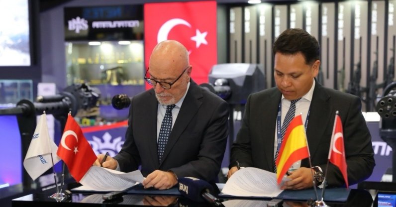 Sarsılmaz Foreign Trade General Manager Nuri Kızıltan (L) and EM&amp;E Group Vice President in Charge of Global Sales M. Jocxan Bojorquez sign a memorandum on cooperation during the SAHA 2026 defense fair, Istanbul, Türkiye, May 6, 2026. (AA Photo)