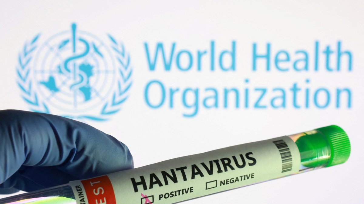 A test tube labelled "Hantavirus positive" label and World Health Organization logo are seen in this illustration, May 7, 2026. (Reuters Photo)