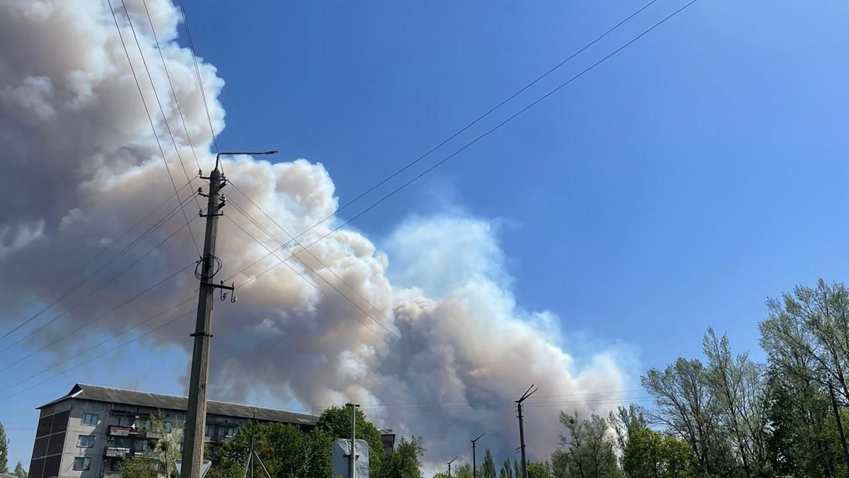 Smoke billows over buildings in the Chernobyl Exclusion Zone in northern Ukraine amid the Russian invasion of Ukraine, Chernobyl, Ukraine, May 8, 2026. (AFP Photo)