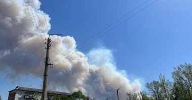 Smoke billows over buildings in the Chernobyl Exclusion Zone in northern Ukraine amid the Russian invasion of Ukraine, Chernobyl, Ukraine, May 8, 2026. (AFP Photo)