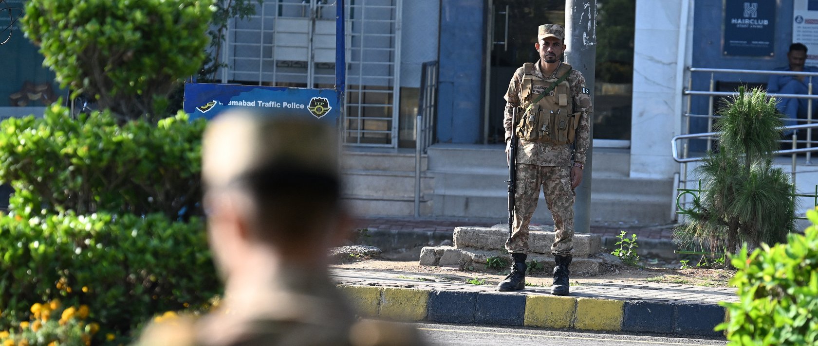 Army soldiers stand alert along a closed street at Red Zone area in Islamabad, April 25, 2026. (AFP File Photo)