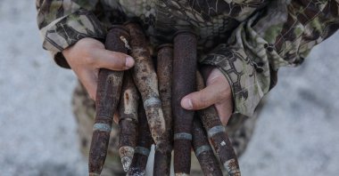 Bomb disposal teams affiliated with the Syrian army safely destroyed mines and unexploded ordnance laid by the terrorist organization YPG on main roads and agricultural lands around Raqqa, Syria, April 30, 2026. (AA Photo)