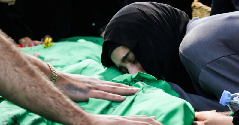 A women grieves as she rests her head on one of nine people killed the day before in an Israeli airstrike on the southern Lebanese village of Jibshit, Sidon, southern Lebanon, May 10, 2026. (AFP Photo)
