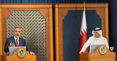 Foreign Minister Hakan Fidan and Qatar's Prime Minister and Foreign Minister Sheikh Mohammed bin Abdulrahman Al Thani speak during a press conference in Doha, Qatar, March 19, 2026. (AP Photo)