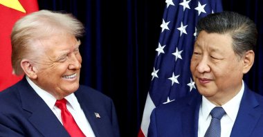 U.S. President Donald Trump and Chinese President Xi Jinping react as they hold a bilateral meeting at Gimhae International Airport, on the sidelines of the Asia-Pacific Economic Cooperation (APEC) summit, in Busan, South Korea, Oct. 30, 2025. (Reuters Photo)