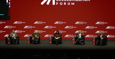 Speakers attend the "Knowledge Production and Circulation in Higher Education" session during the World Decolonization Forum at the Atatürk Cultural Center, May 11, 2026. (AA Photo)