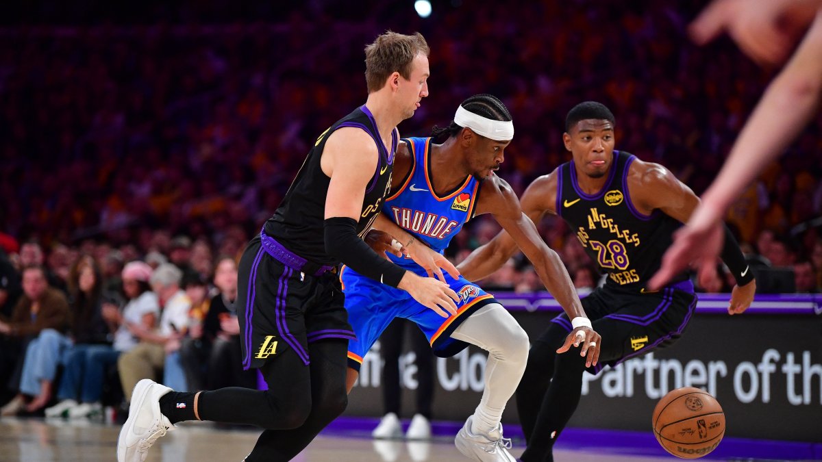 Los Angeles Lakers' Luke Kennard (L) and Rui Hachimura (R) move in for the ball against Oklahoma City Thunder's Shai Gilgeous-Alexander during the second half in game four of the second round of the 2026 NBA Playoffs at Crypto.com Arena, Los Angeles, U.S., May 11, 2026. (Reuters Photo)